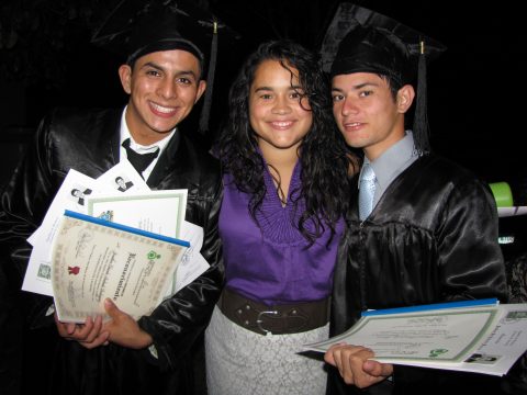 Here, Amanda celebrates two children who graduated high school and later attended university through her Crezco program.