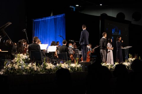 The orchestra preparing to play.