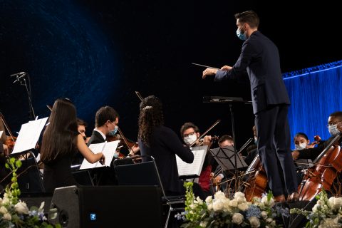 The orchestra playing during the divine service.