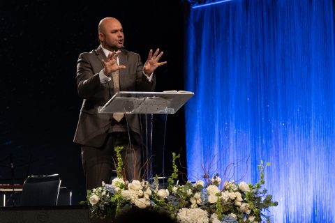 Adam Ramdin emphasizes a point during his message.