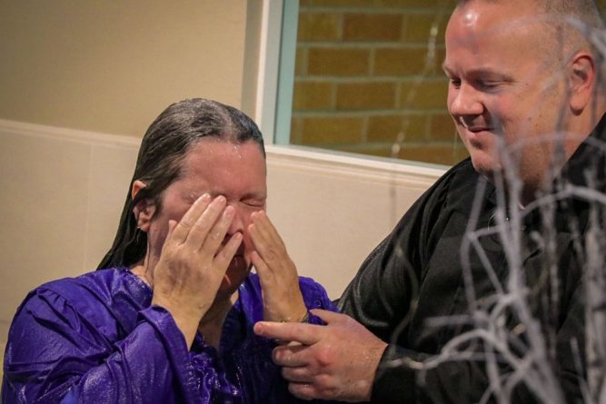Karen baptized by Pastor Cory Herthel